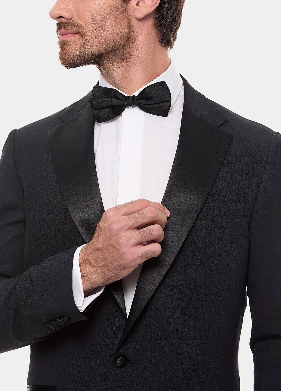 smoking negro para hombre listo para usar es la prenda perfecta para eventos de etiqueta formal como galas, bodas elegantes o cenas de gala, ofreciendo un estilo impecable que refleja status y distinción. Con su diseño clásico, este smoking ready to wear asegura que luzcas sofisticado y a la altura de cualquier ocasión de alto nivel.